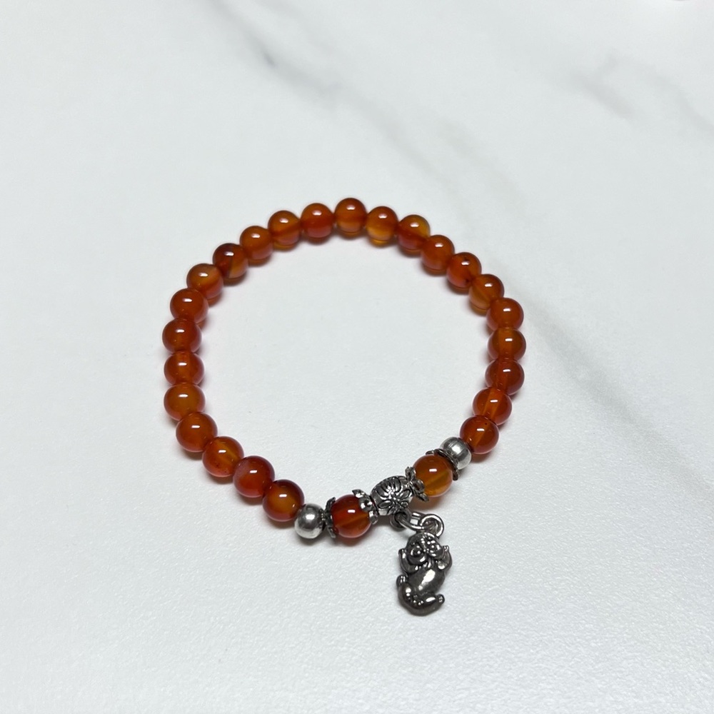 Red Beaded Bracelet with Silver Charm